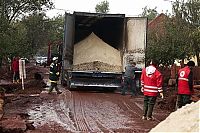 World & Travel: Red sludge alumina factory reservoir pollutes villages, Hungary