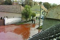 World & Travel: Red sludge alumina factory reservoir pollutes villages, Hungary