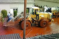 World & Travel: Red sludge alumina factory reservoir pollutes villages, Hungary