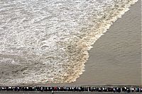 TopRq.com search results: World's largest tidal bore, Qiantang River, China