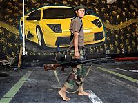 TopRq.com search results: Rebels inside Muammar Muhammad al-Gaddafi villas, Libya