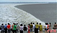 TopRq.com search results: World's larges tidal bore, 9 metres (30 ft) high, Qiantang River, China