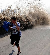 TopRq.com search results: World's larges tidal bore, 9 metres (30 ft) high, Qiantang River, China