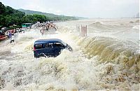 TopRq.com search results: World's larges tidal bore, 9 metres (30 ft) high, Qiantang River, China