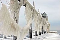 World & Travel: lighthouse in waves