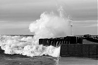 World & Travel: lighthouse in waves