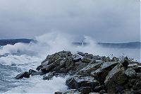 World & Travel: lighthouse in waves