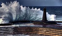 World & Travel: lighthouse in waves