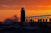 World & Travel: lighthouse in waves