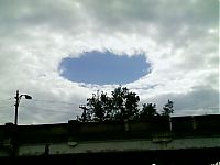 World & Travel: sky fallstreak hole cloud