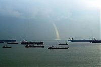 World & Travel: waterspout tornado