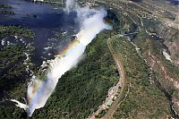 World & Travel: Rainbow over Victoria Falls, Zambezi River, Africa