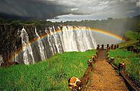 World & Travel: Rainbow over Victoria Falls, Zambezi River, Africa