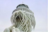 World & Travel: Frozen lighthouse, St. Joseph North Pier, Lake Michigan, North America