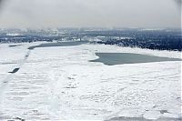 World & Travel: The Great Lakes frozen, Canada–United States border, North America